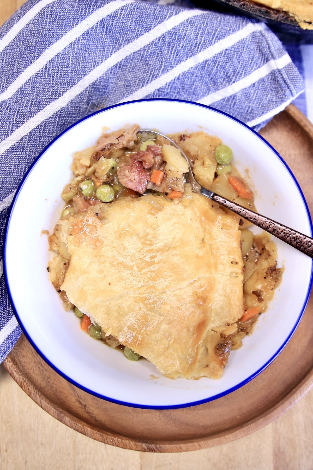 Bowl of pot pie with spoon.