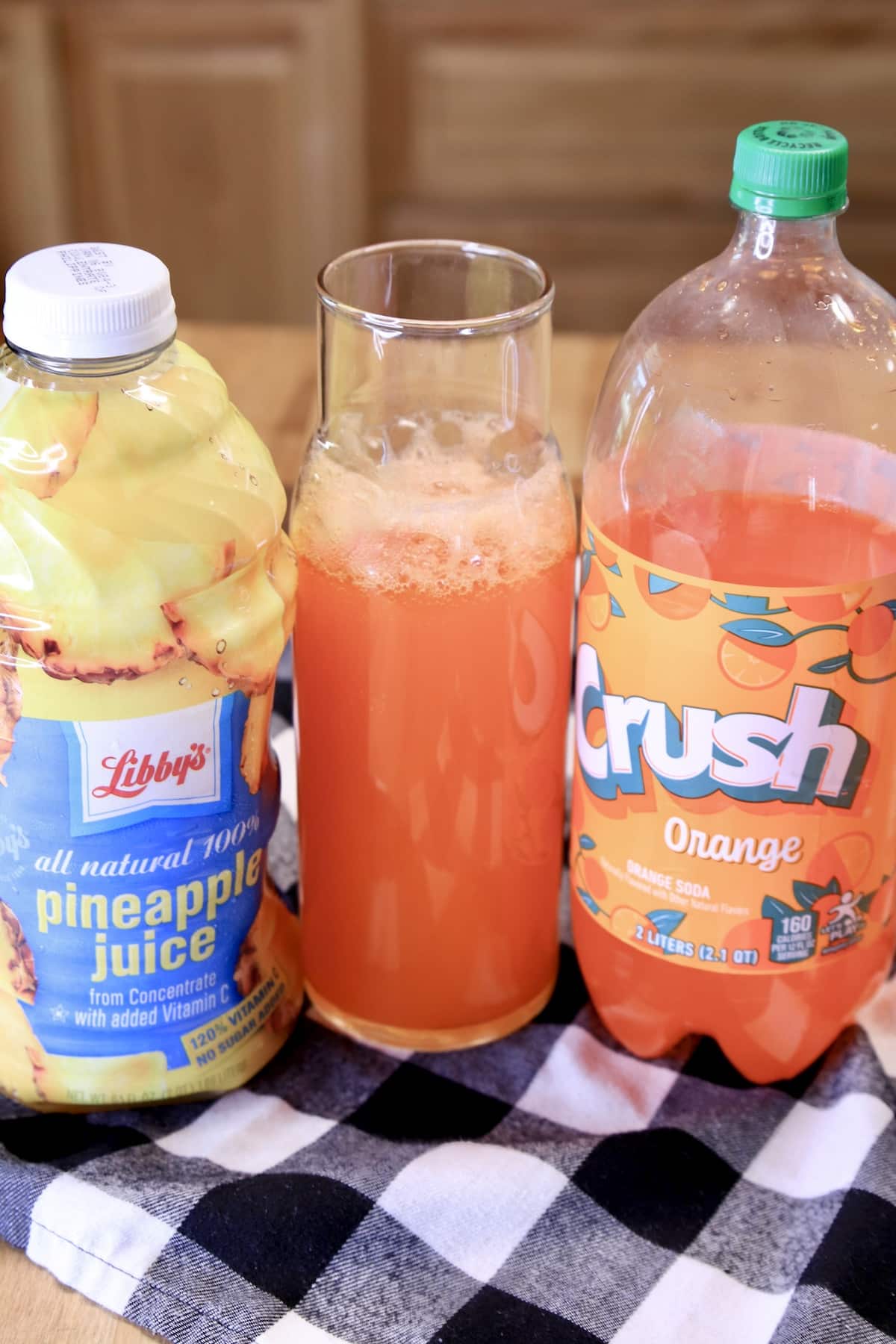 Pineapple Juice, Orange Punch, Orange Soda bottle.