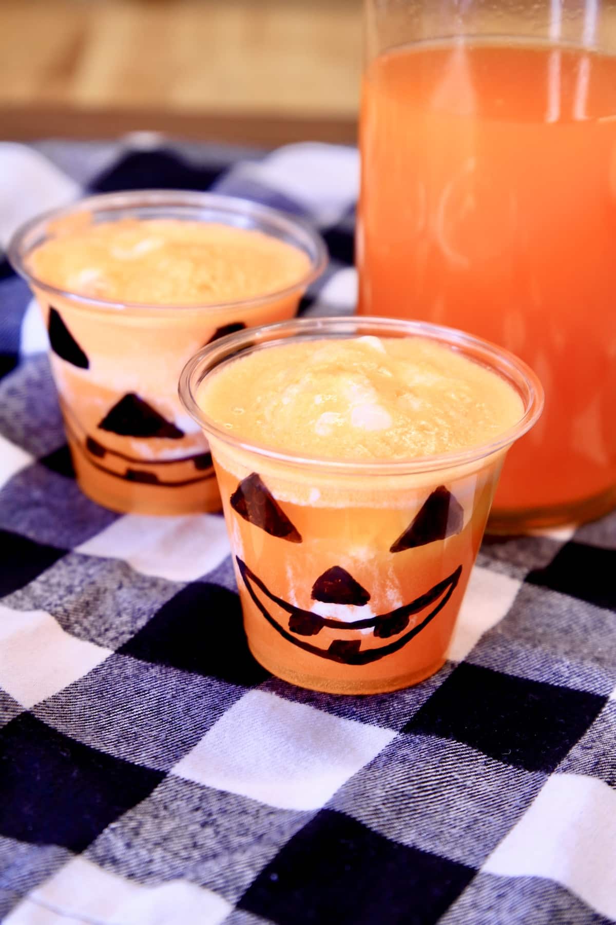 Halloween Party Punch in 2 jack-o-latern-glasses.