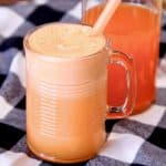 Orange Punch in a mug with straw.