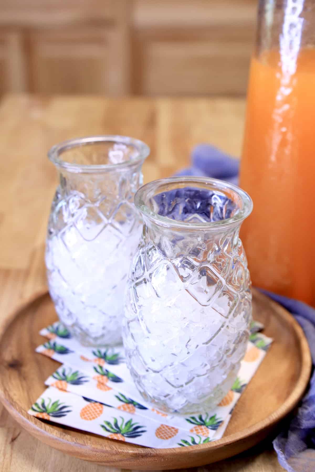 Pineapple glasses with crushed ice.