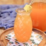 Pineapple Orange Wine Punch in pineapple glass.
