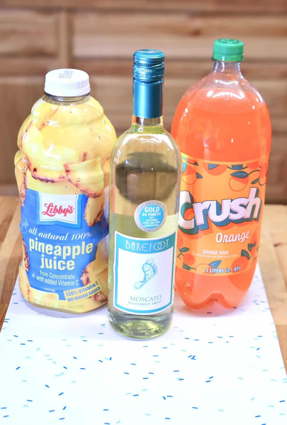 Pineapple juice, moscato wine, Orange Crush soda.