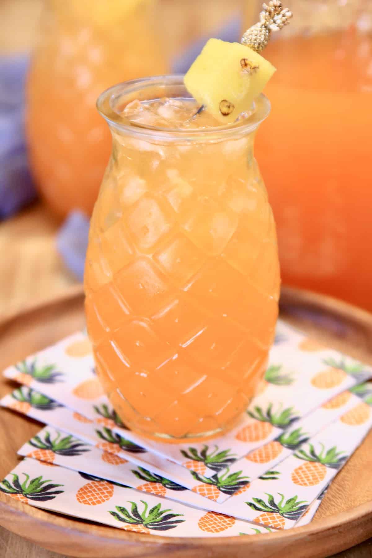 Pineapple Orange Punch in pineapple glass.