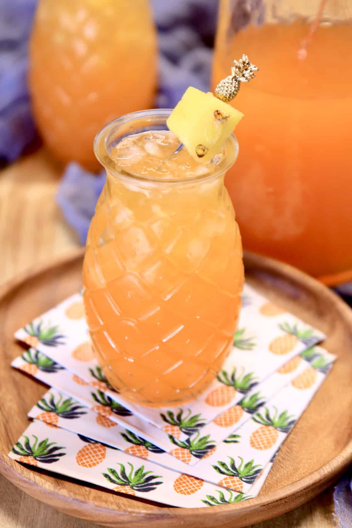 Pineapple glass with pineapple orange punch. 