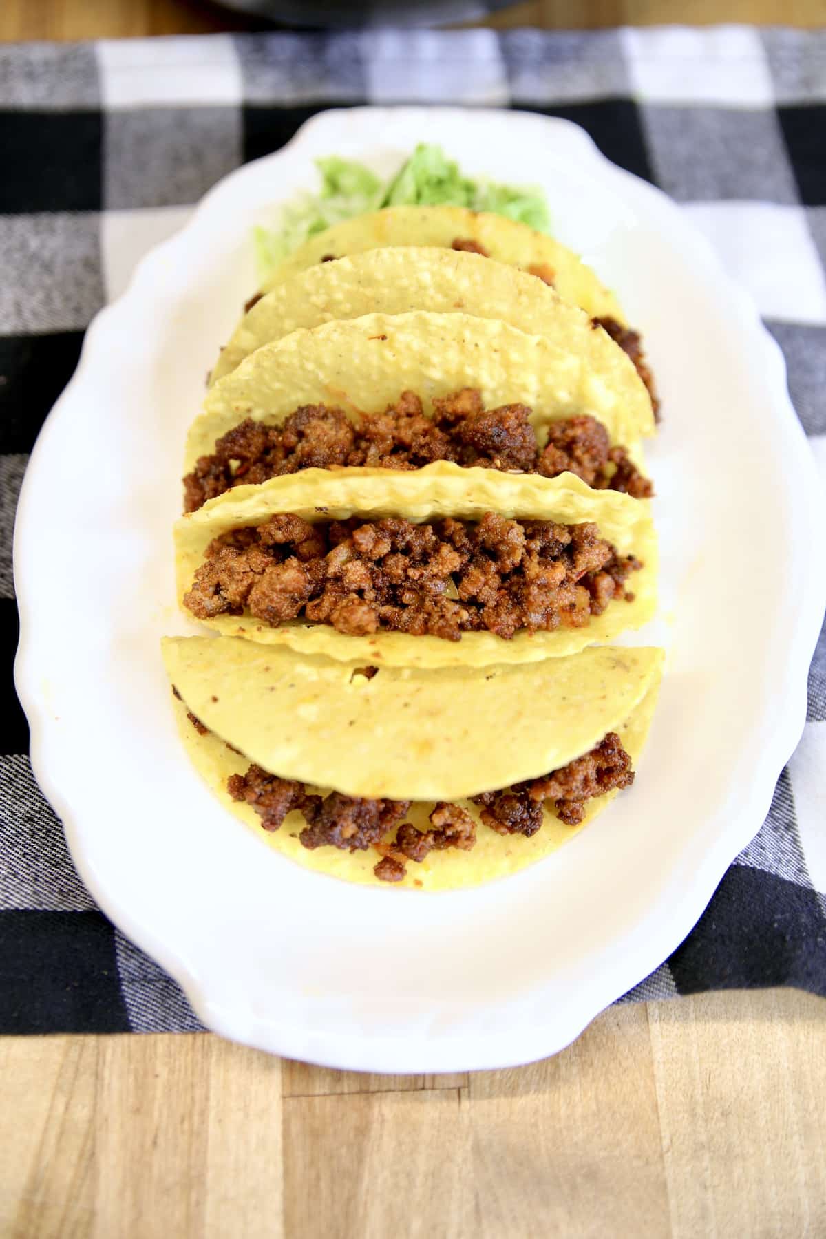 Crispy taco shells filled with seasoned ground beef.