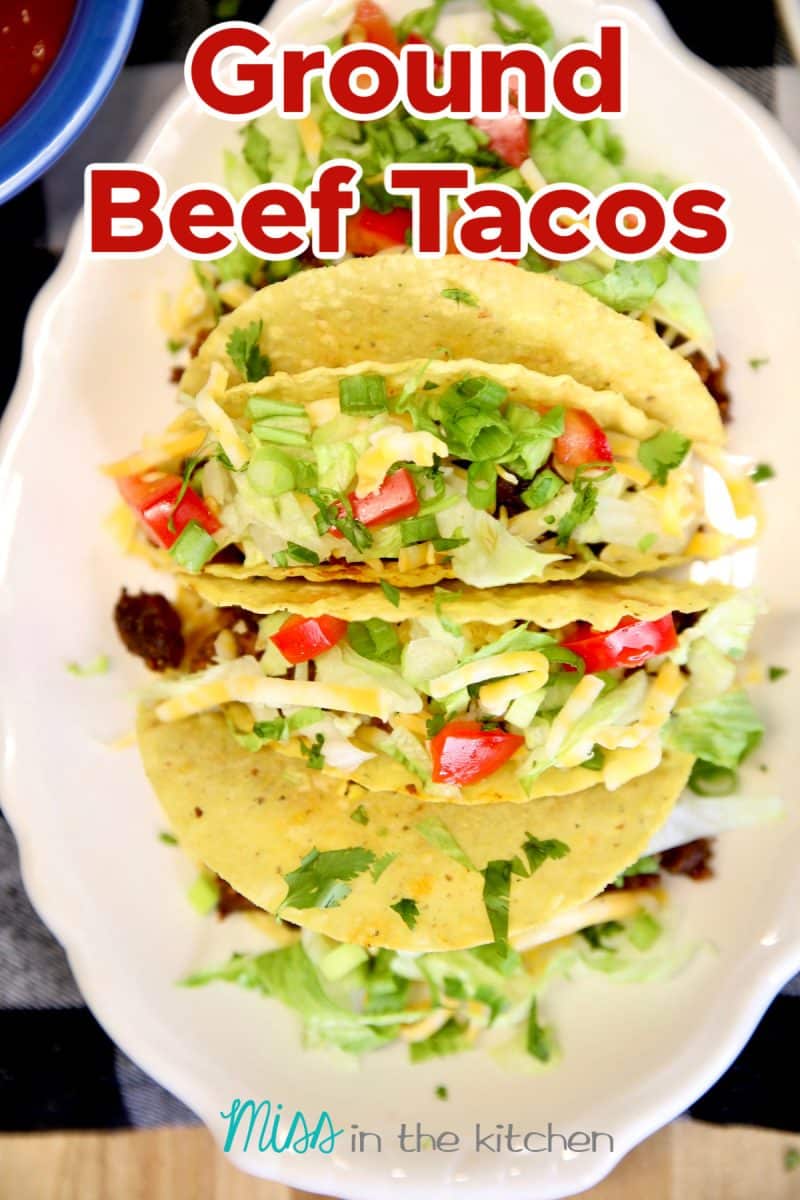 Ground Beef Tacos on a platter with text overlay.