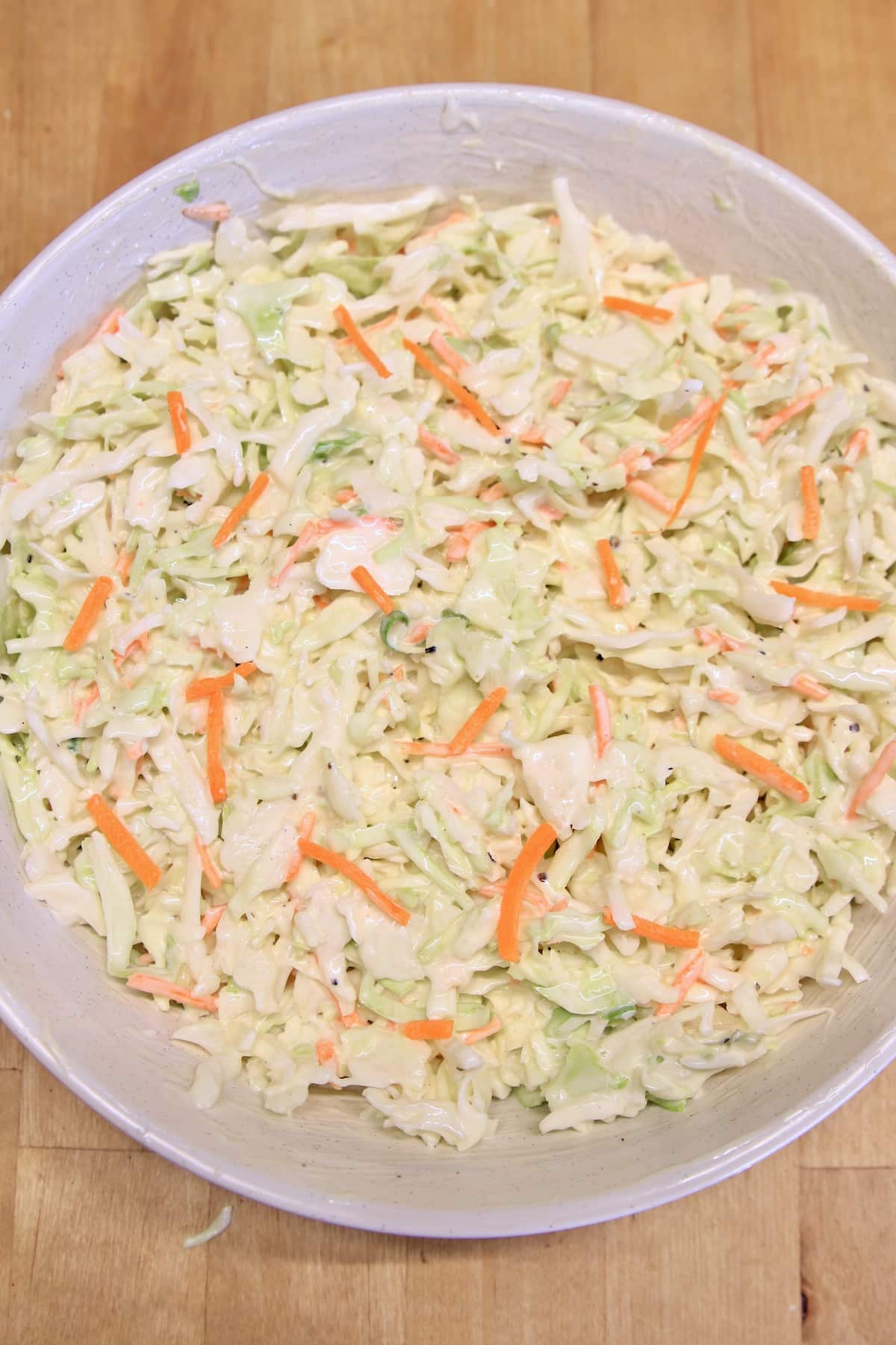 Bowl of creamy coleslaw.