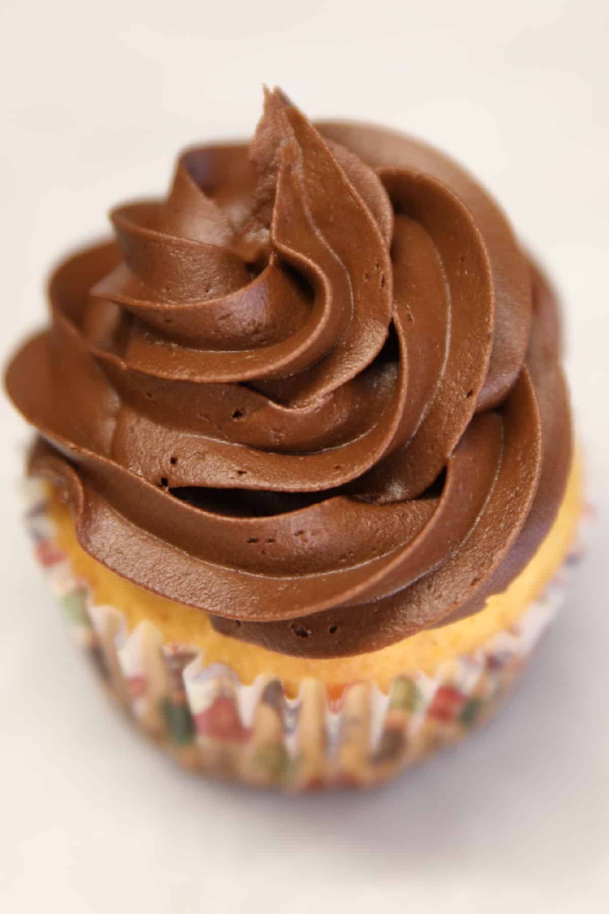 Chocolate cupcake with chocolate icing.