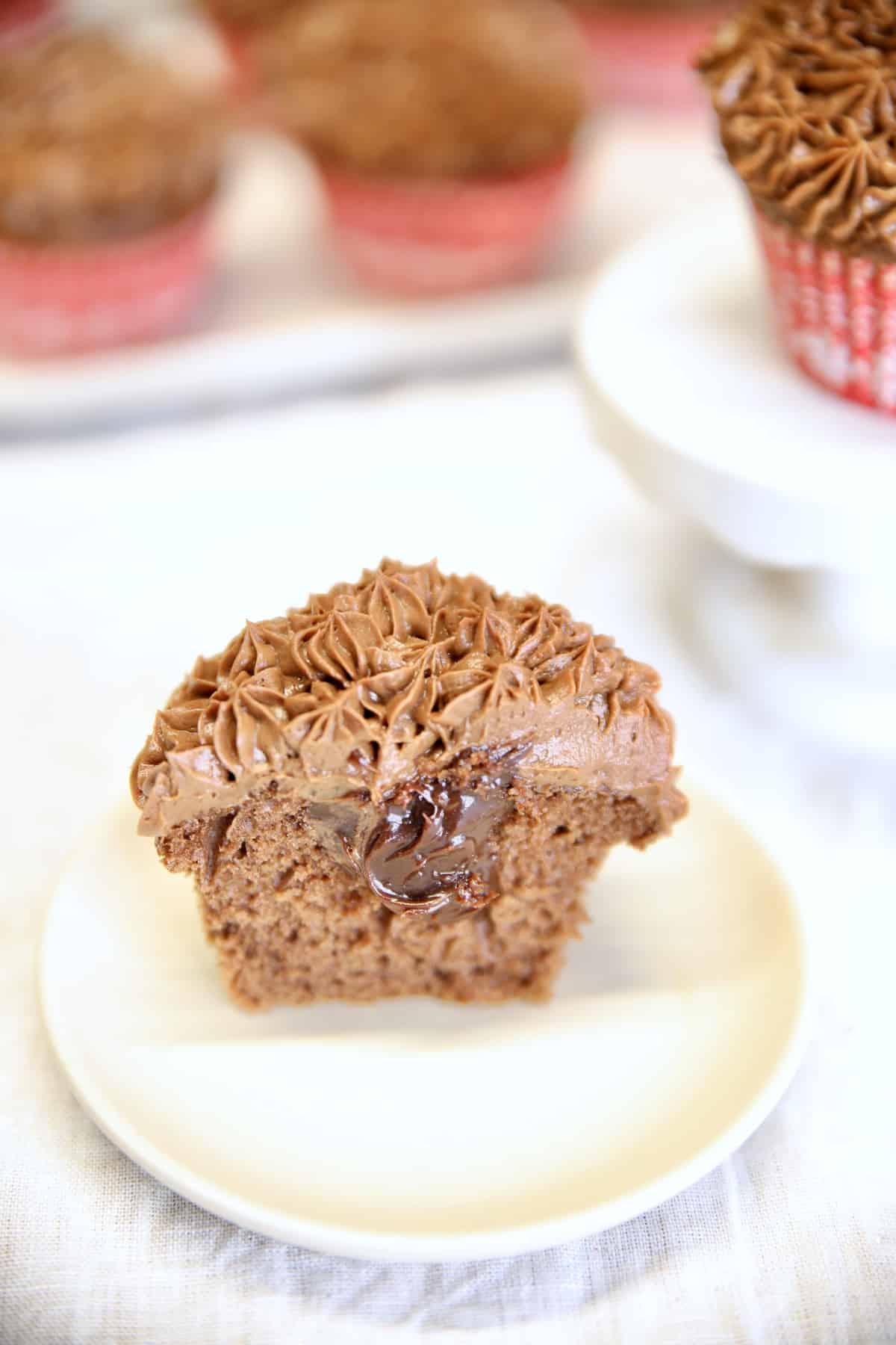 Chocolate ganache filled cupcake, cut in half.