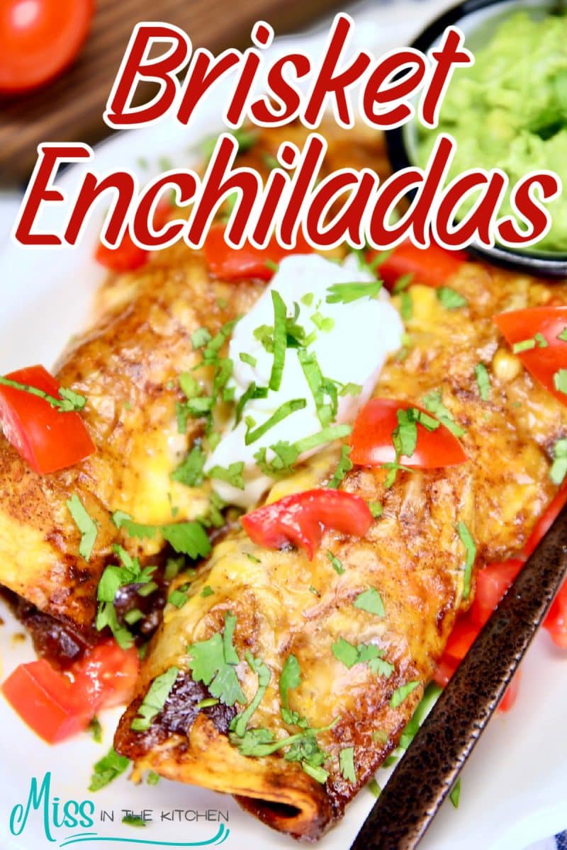 Brisket Enchilada on a plate with text overlay.