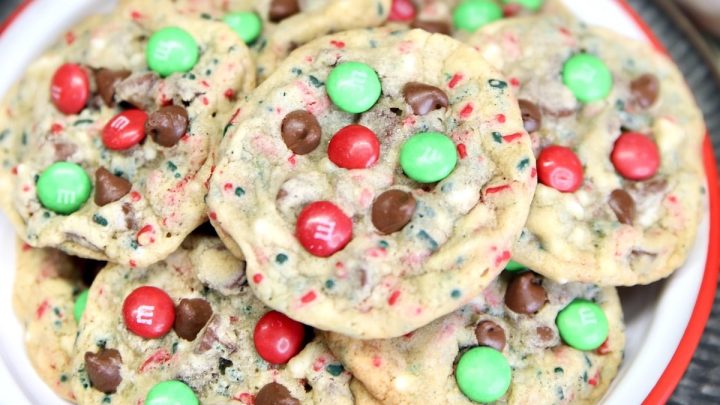 Plate of chocolate chip sprinkle cookies with M&Ms.