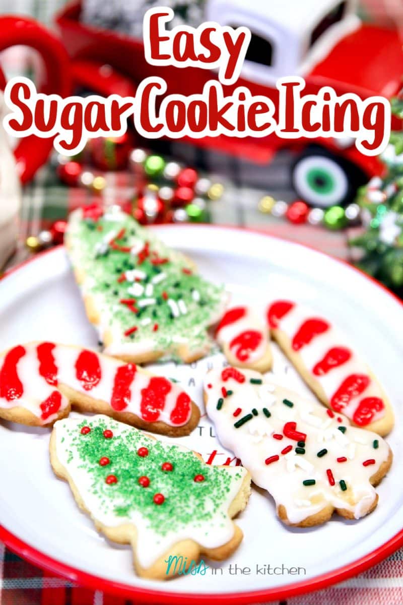 Plate of decorated Christmas cookies - text overlay.