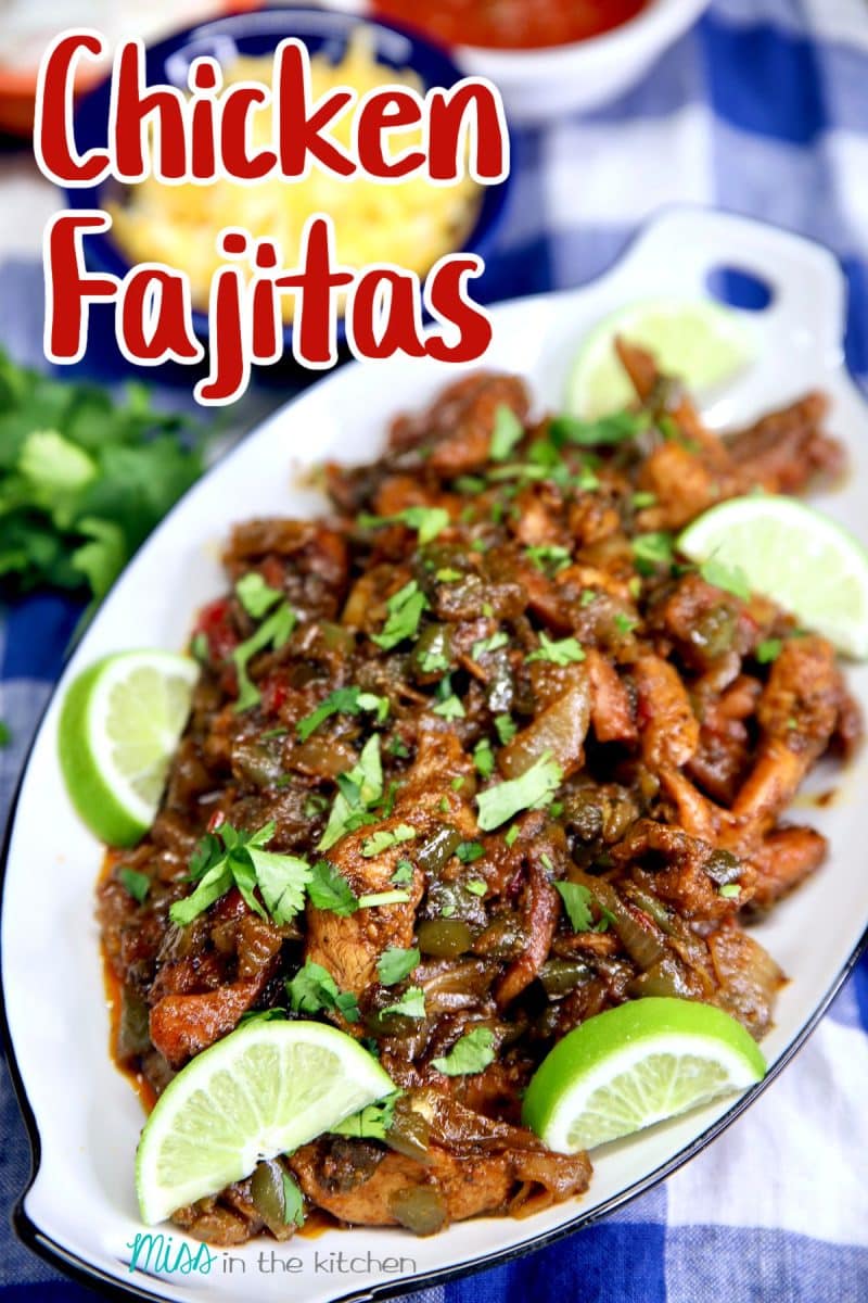 Chicken fajitas on a platter with lime slices, cilantro. Text overlay.