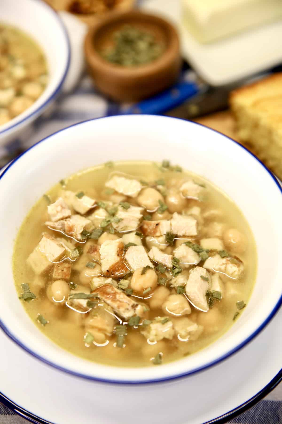 Bowl of chickpea chicken soup.