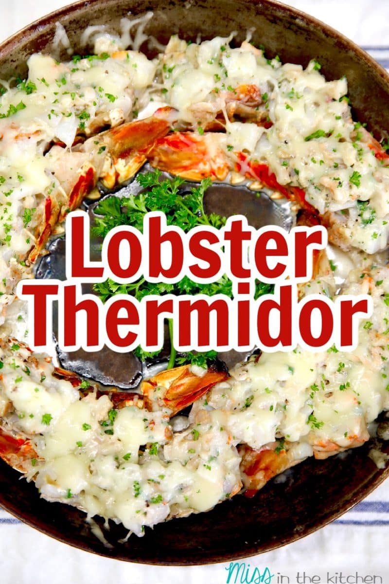 Lobster Thermidor in a skillet. Text overlay.