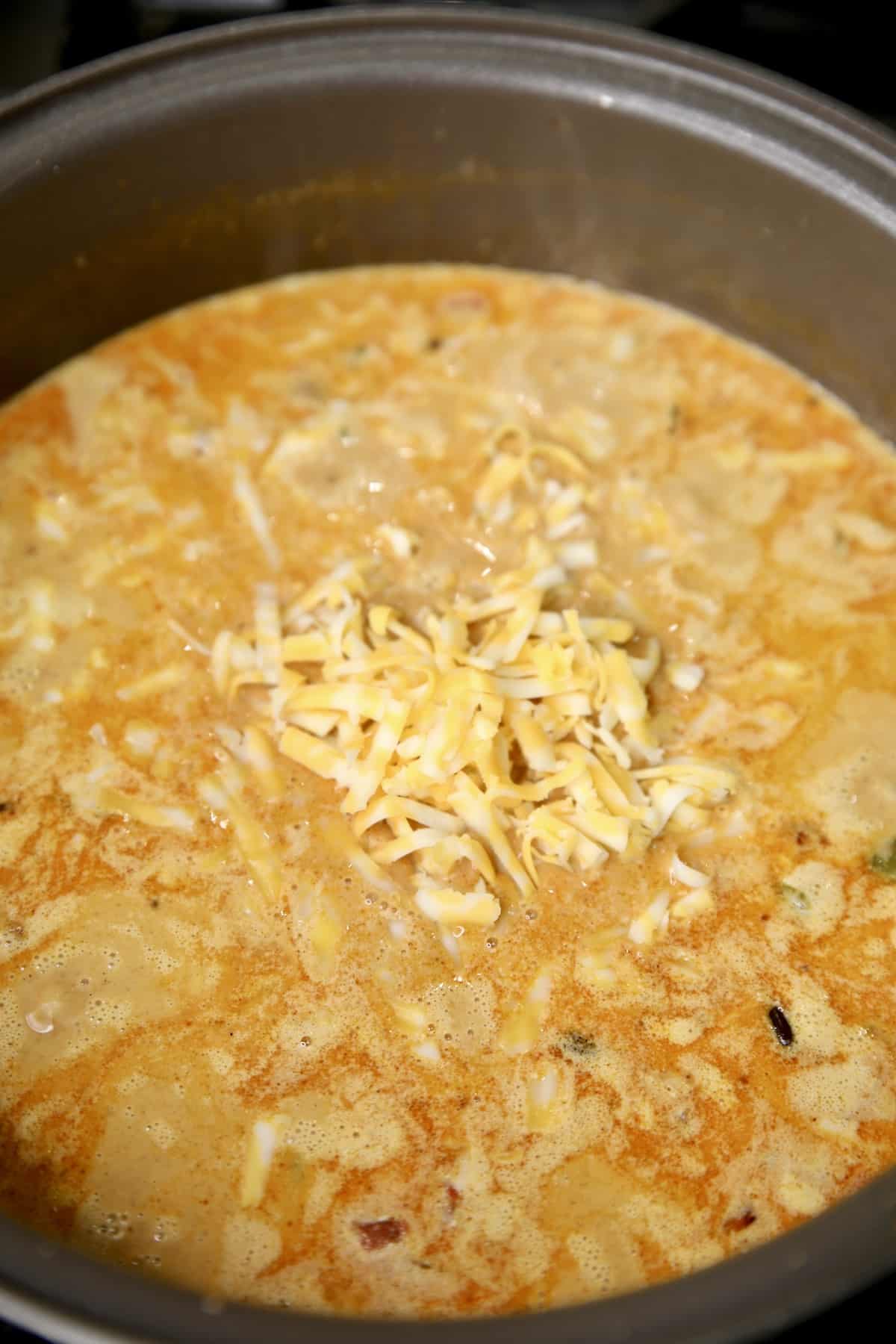 Chicken Enchilada Soup with cheese.