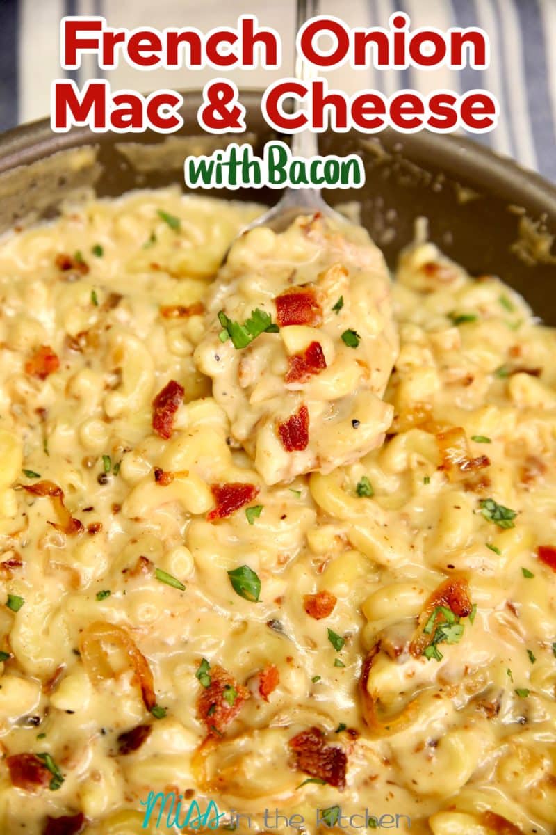French Onion Mac and Cheese with crispy bacon. Spoonful from pan - text overlay.