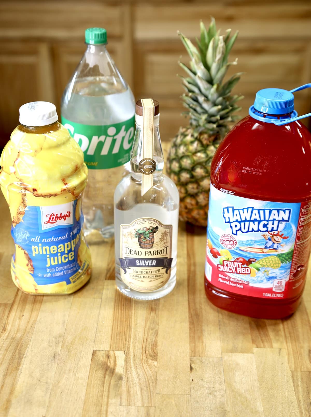 Pineapple juice, Sprite, Hawaiian punch, light rum, fresh pineapple.