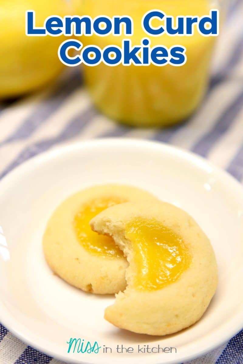 2 lemon curd cookies on a plate, one with bite out. Text overlay.