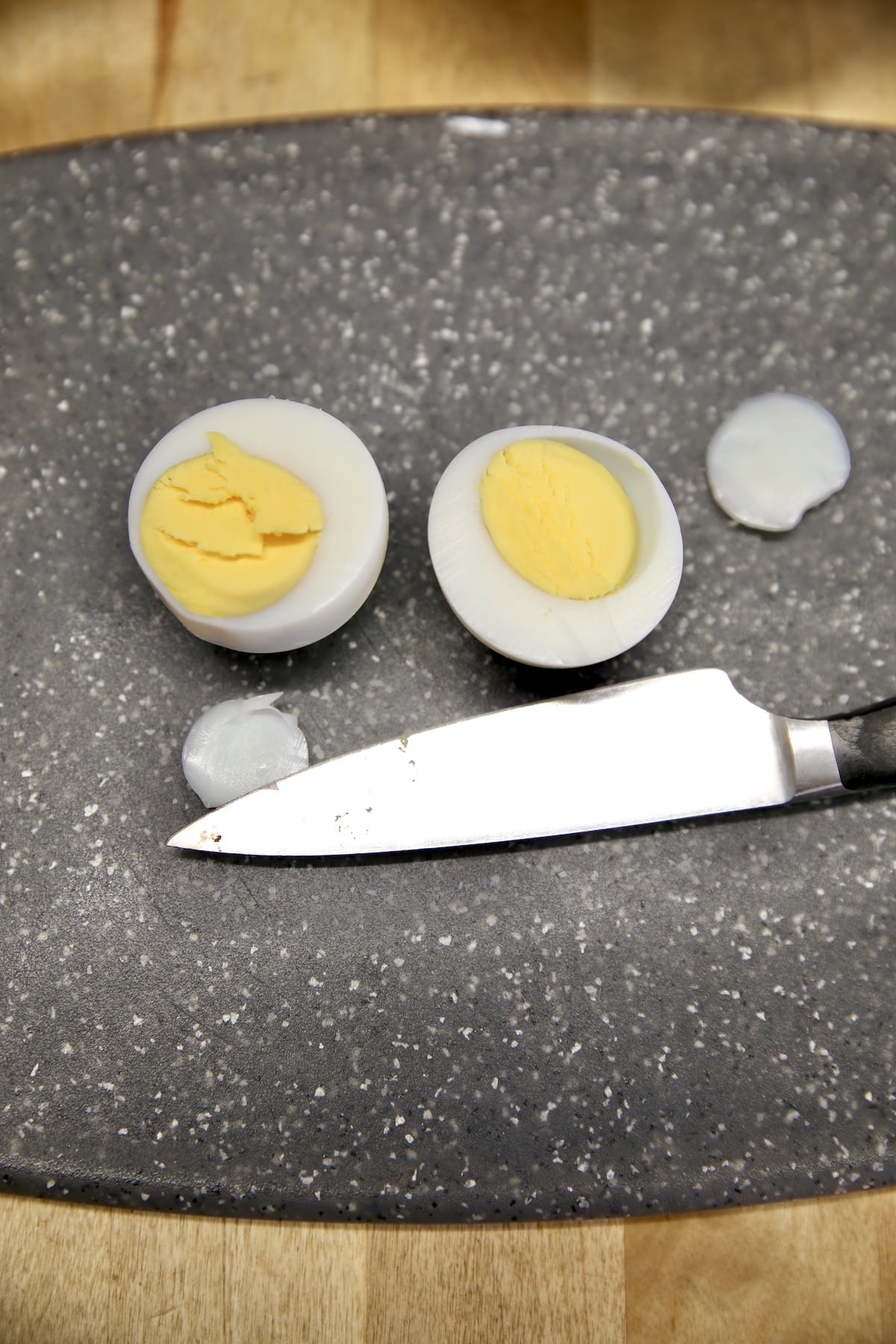 Hard boiled egg cut in half with ends removed. 