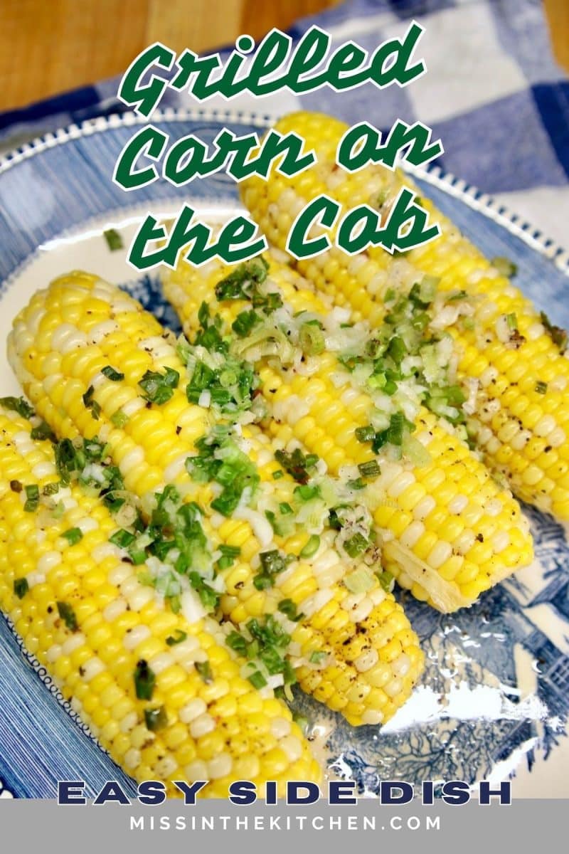Grilled Corn on the Cob on a platter - text overlay.