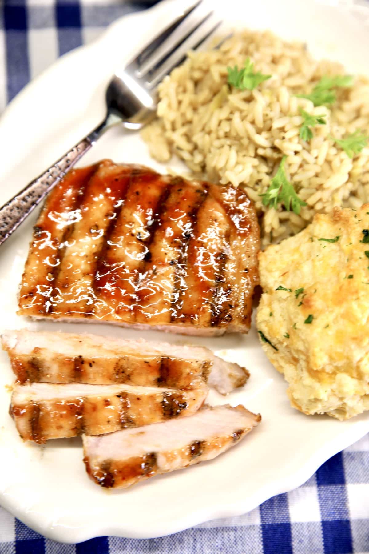 Jalapeno BBQ Grilled pork chop on a plate.