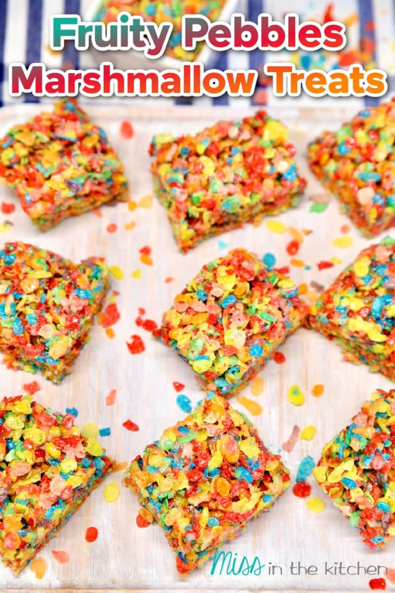 Marshmallow bars made with Fruity Pebbles cut into squares.