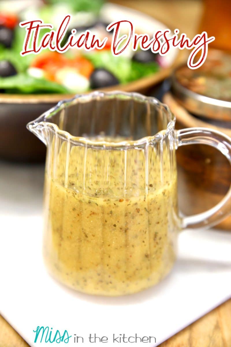 Pitcher of Italian dressing with text overlay.