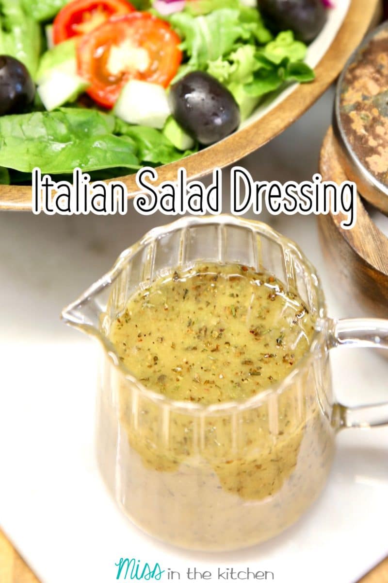 Pitcher of Italian dressing with salad. Text overlay.
