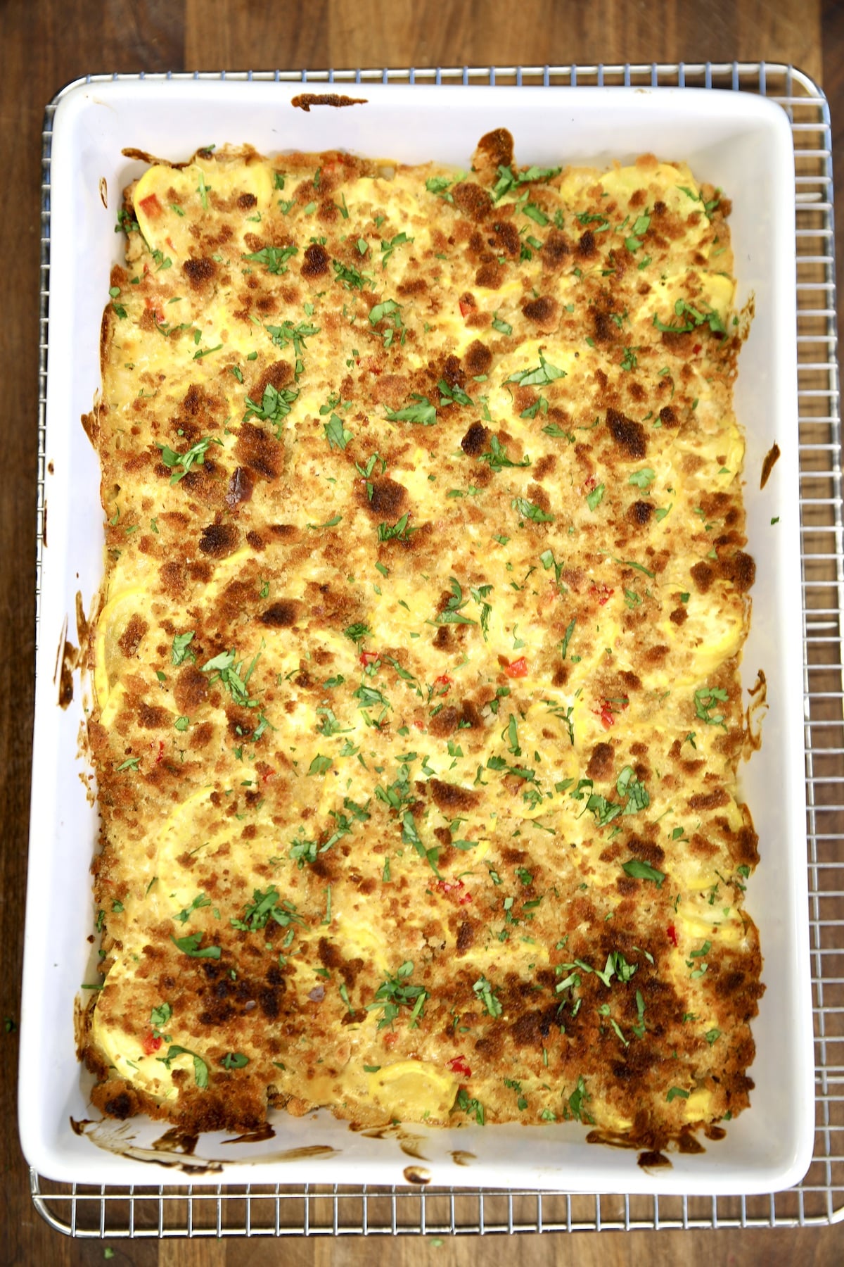 Baked squash casserole in a 9 x 13 inch dish.