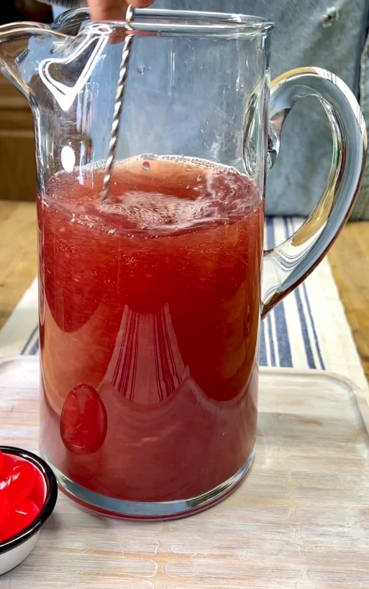 Pitcher of cherry limeade cocktail.