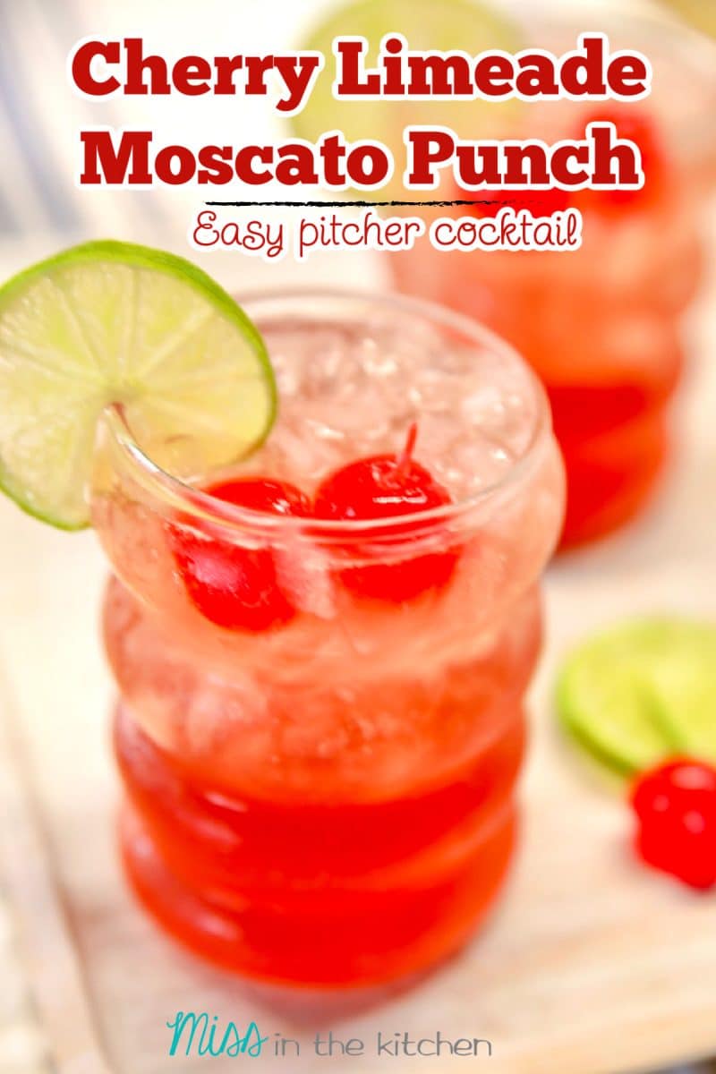 Cherry Limeade Moscato Punch with cherry and lime garnish. Text overlay.