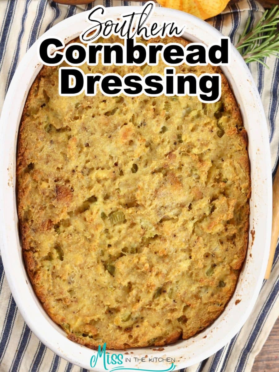 Oval dish of cornbread dressing-text overlay.