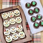Snowman and Christmas tree decorated chocolate covered oreos.