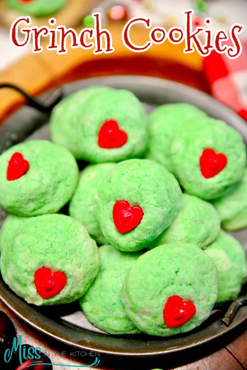 Platter of Grinch Cookies with text overlay.