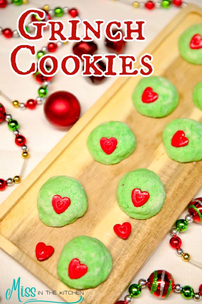 Platter of grinch cookies with text overlay.