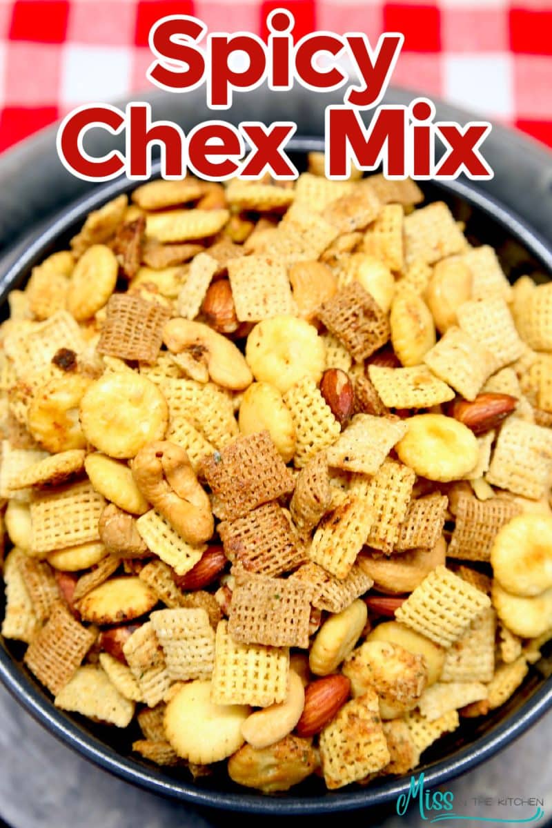 Spicy Chex Mix snack in a jar - text overlay.