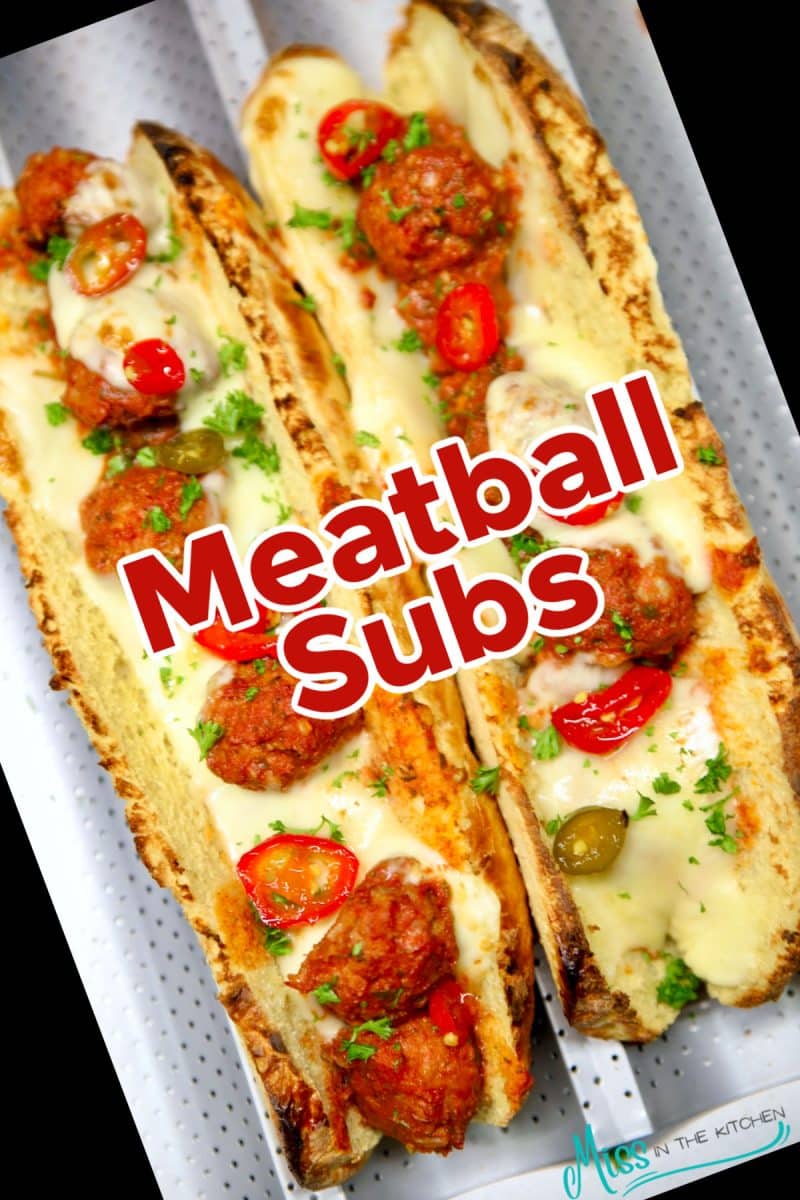 Meatball subs on a pan - text overlay.