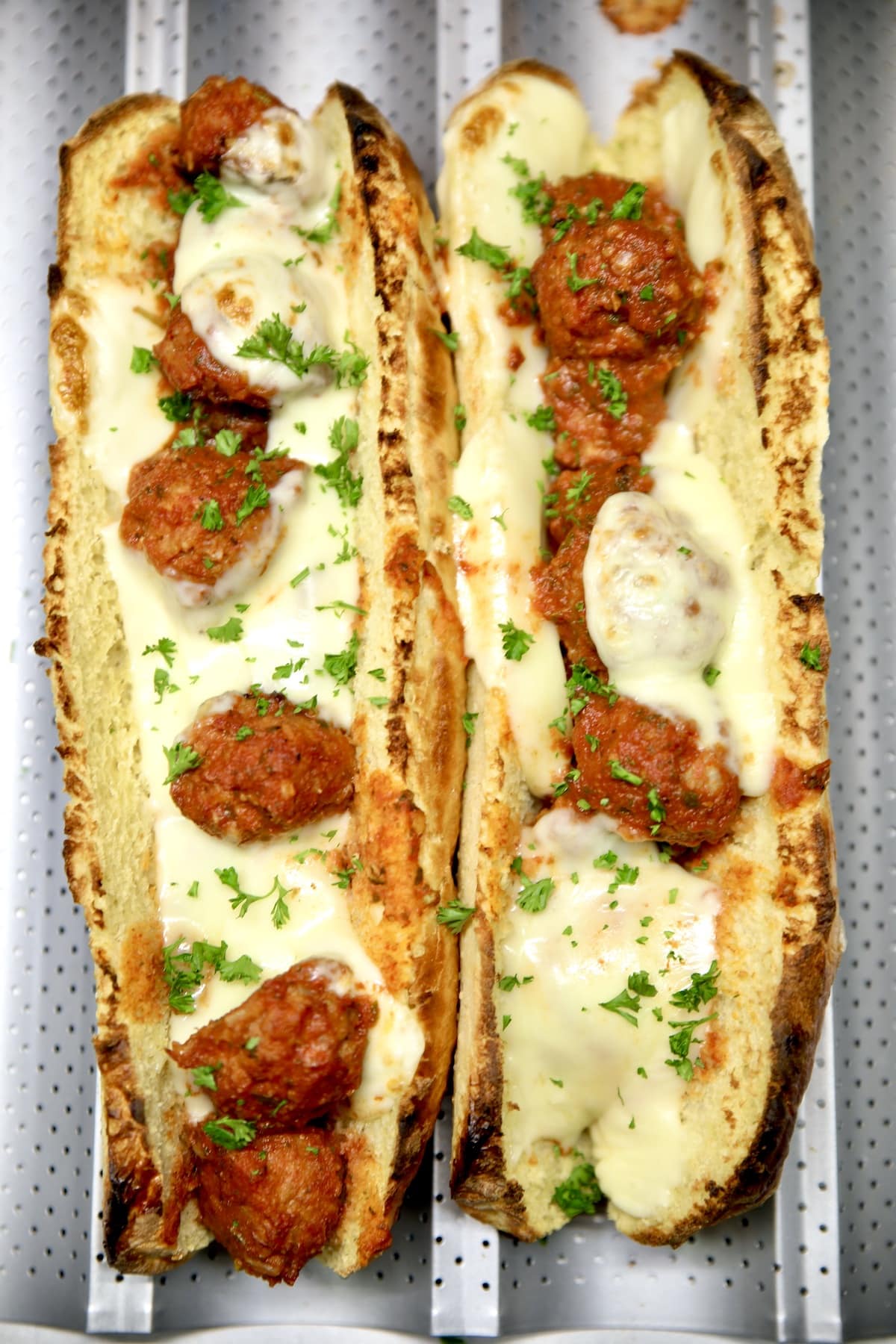 Meatball Subs with melted cheese.