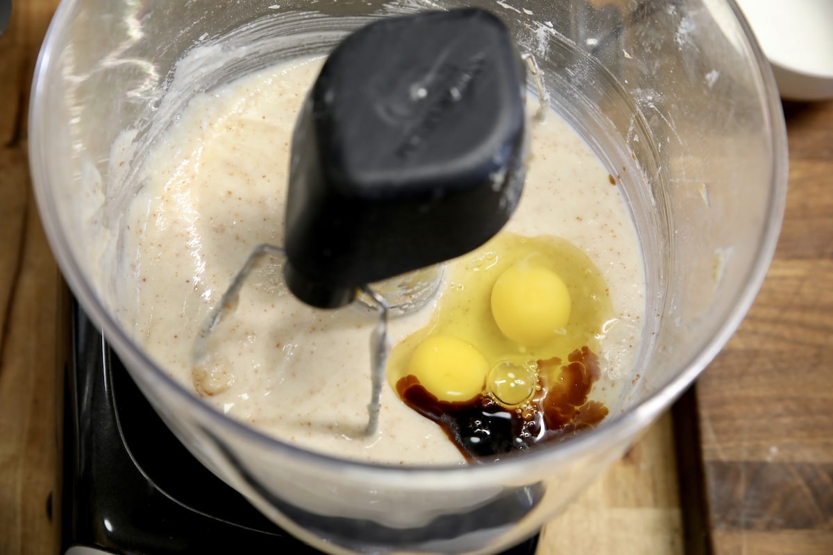 2 eggs and vanilla in a mixer bowl with sugar and butter.