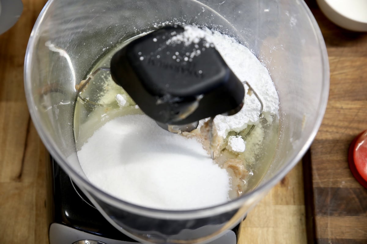 Sugar and brown butter in a mixer.