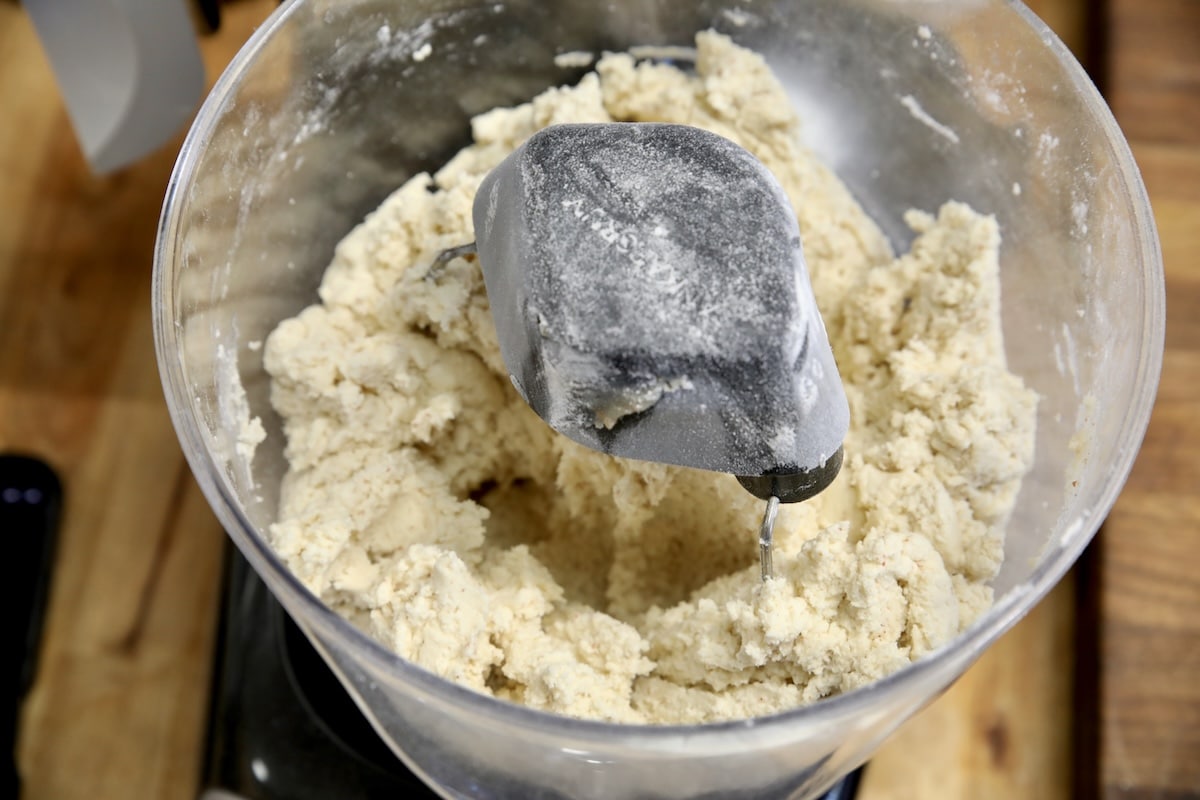 Cookie dough in a mixer bowl.