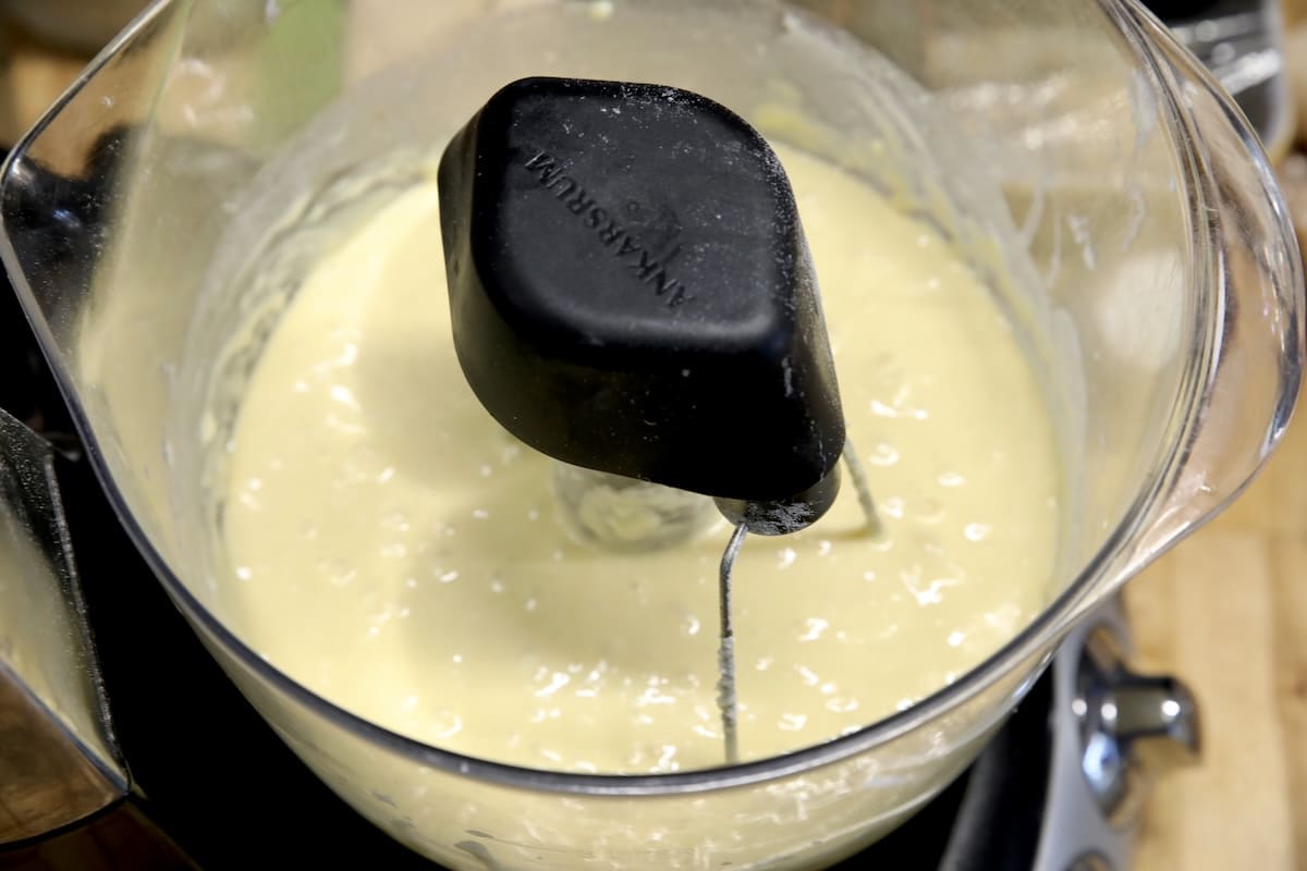 Cake batter in mixer bowl.