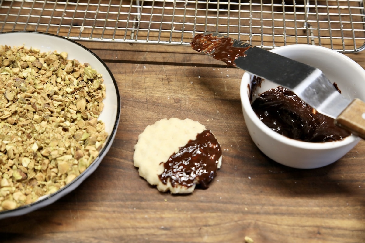 Melted chocolate spread on half of a cookie.