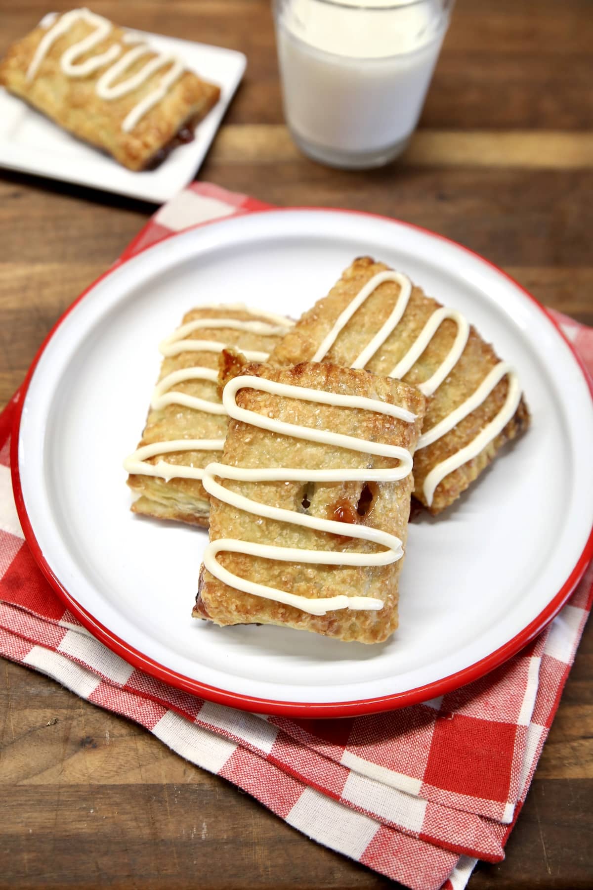 Toaster strudel pastries on a plate.
