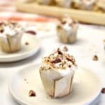Butter pecan cupcake mini dessert on a plate.