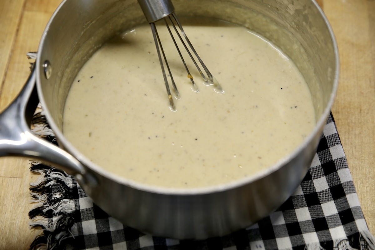 Pan of salsa verde sauce for enchiladas.