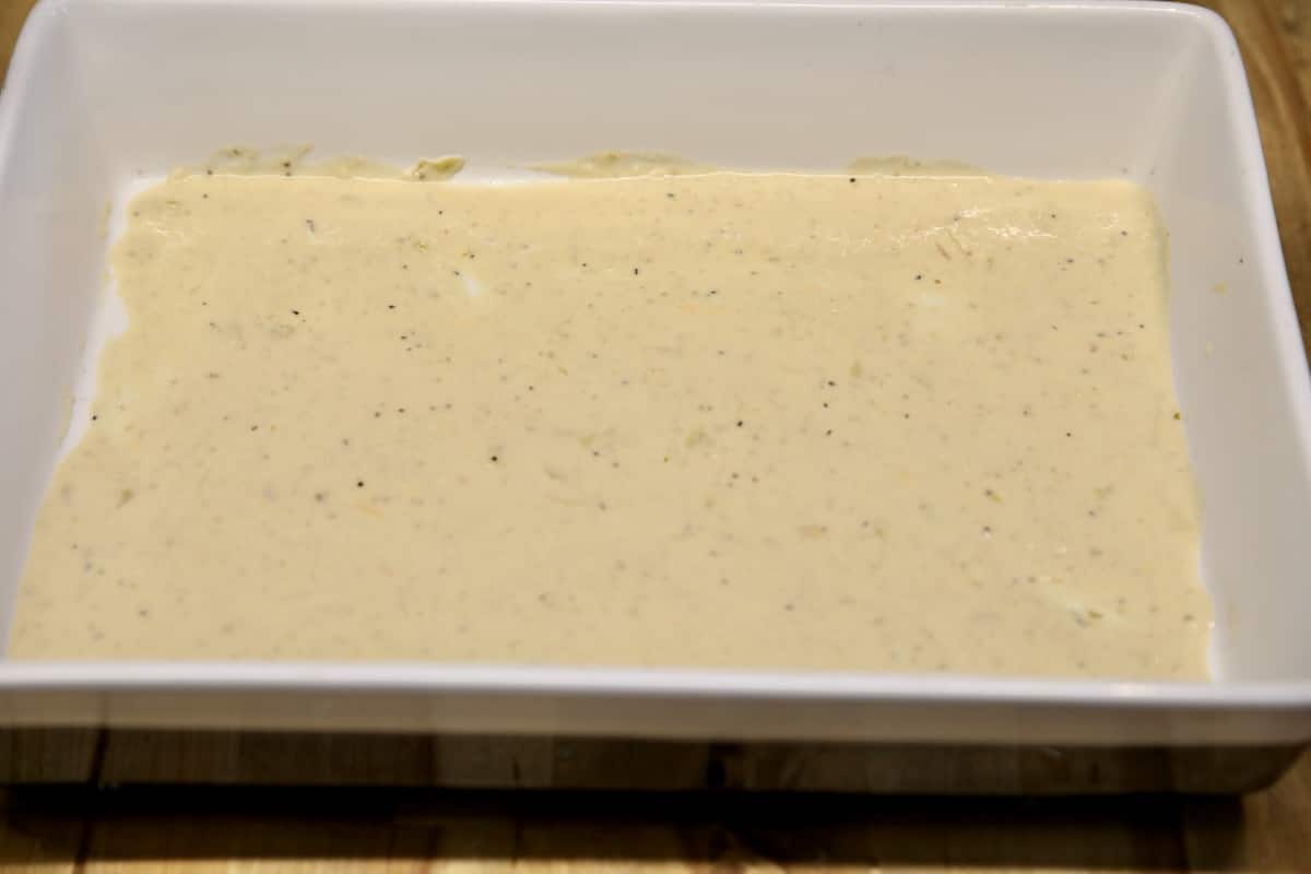 13 x 9 pan with salsa verde sauce in the bottom.