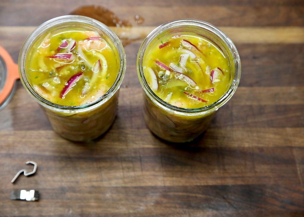 2 Jars of pickled shrimp.